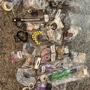 Paparazzi New and New without tags. 36 plus items.